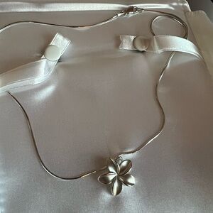 Na Hoku plumeria pendant